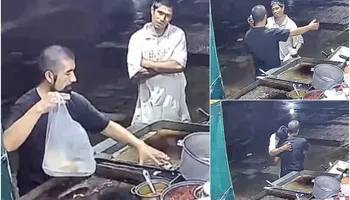Un taquero abraza a un joven después de prepararle unos tacos.