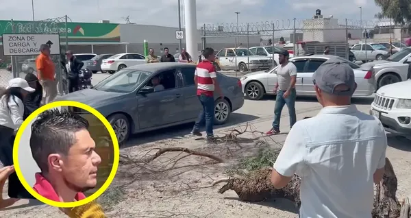 Vecinos de Mineral de la Reforma denunciaron que un hombre vestido con camiseta a rayas blancas con rojas estaba presuntamente armado al momento de amedrentar a los manifestantes.