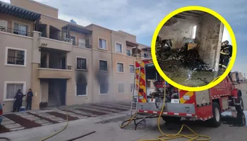 Bomberos de la Secretaría de Seguridad Pública trabajando en el incendio de una casa en Viñedos.
