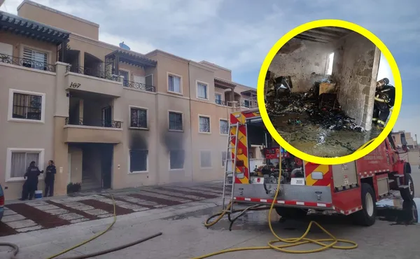 Bomberos de la Secretaría de Seguridad Pública trabajando en el incendio de una casa en Viñedos.