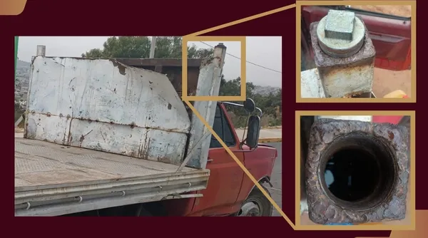 Camioneta de carga con compartimento secreto asegurada por policía estatal.